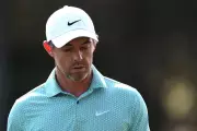 Rory McIlroy Defends Players Title Despite Back Injury Concerns