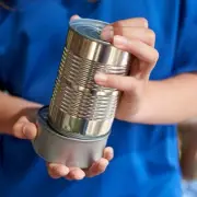 Upcycle Tin Cans into Charming Garden Planters This Spring