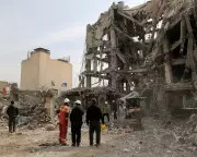 US-Israeli Strikes on Tehran Buildings Spark War Crimes Allegations
