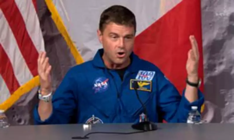 Astronaut's Emotional Return: Cross on Navy Chaplain's Collar Brings Tears