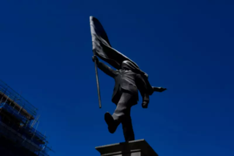Banksy Claims New London Statue of Man Blinded by Flag