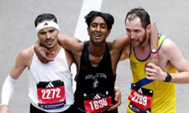 Boston Marathon Runners Praised for Helping Collapsed Competitor Finish