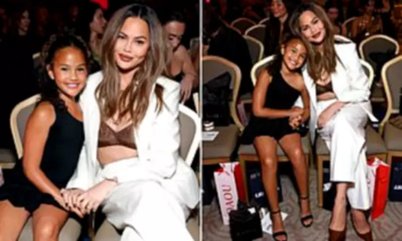 Chrissy Teigen and Daughter Luna Shine at Fashion Awards Family Outing