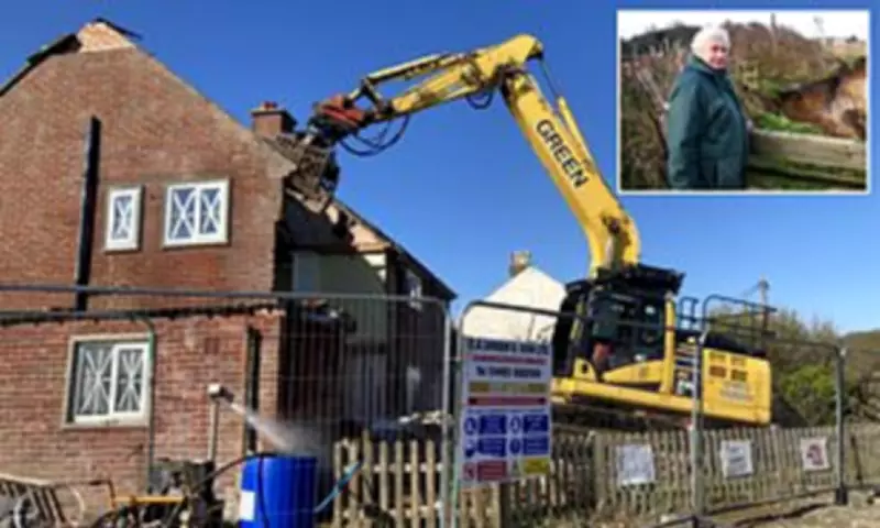 Demolition of Three Erosion-Threatened Homes in Norfolk Village Begins