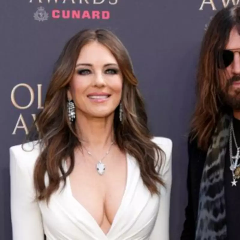 Elizabeth Hurley and Billy Ray Cyrus Dazzle at 50th Olivier Awards Red Carpet