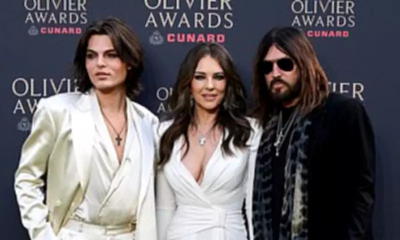 Elizabeth Hurley Stuns at Olivier Awards with Billy Ray Cyrus and Son