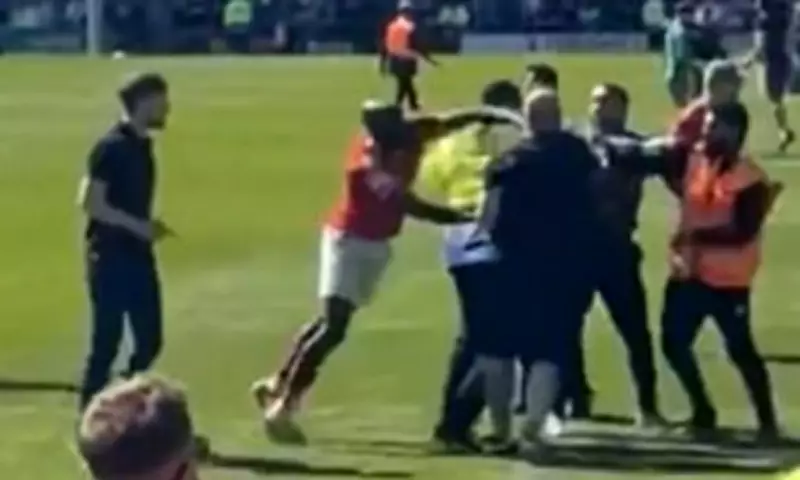 FA and Police Investigate Rochdale Pitch Invasion and Boateng Punch
