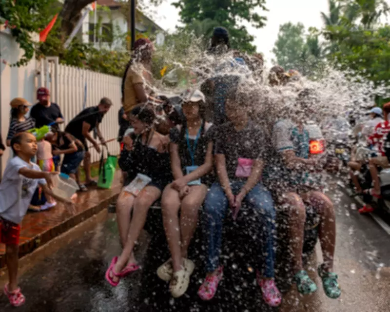 Global Snapshot: Water Fight in Laos and Coal-Fired Fiat Among Daily Photos
