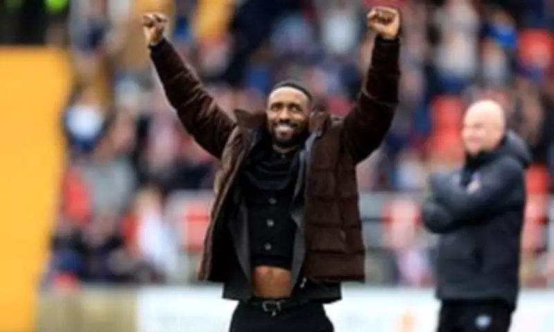 Jermain Defoe's Managerial Debut: A Rollercoaster Draw for Woking