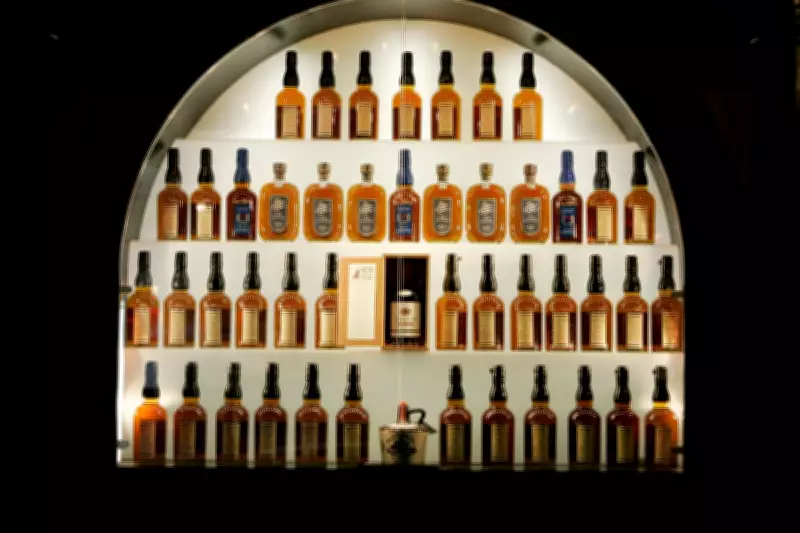 Kentucky Bourbon Industry Faces Crisis as Production Cuts Clash with Billion-Dollar Bets