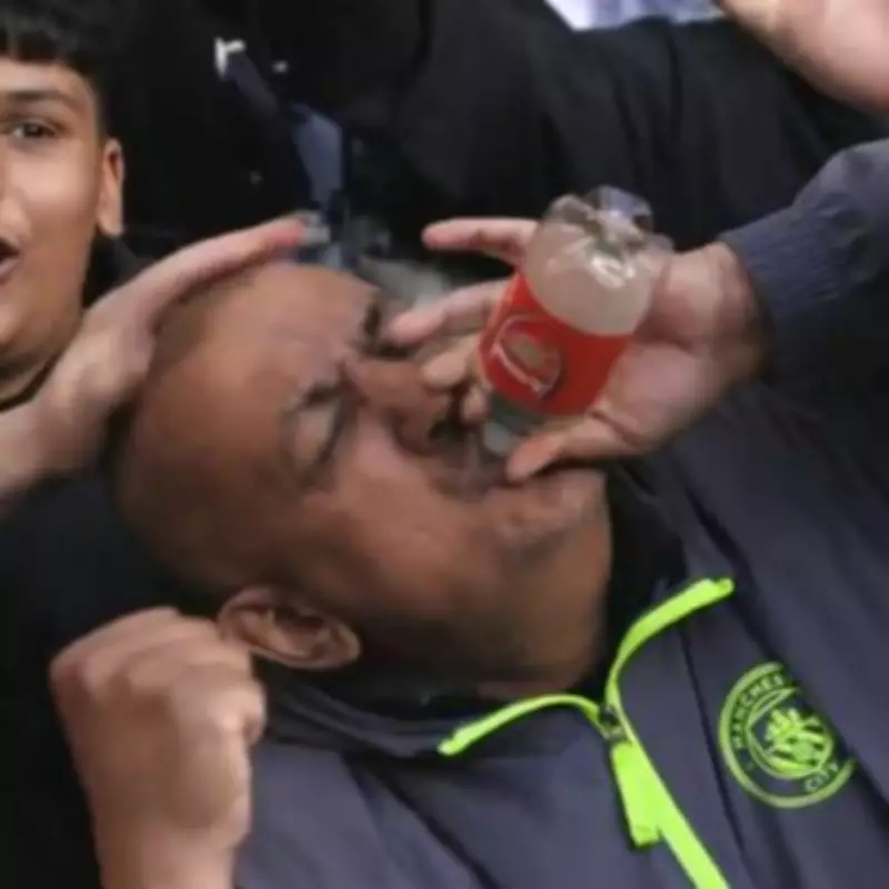 Man City Fans Taunt Arsenal with Viral Bottle Gesture at Chelsea Clash