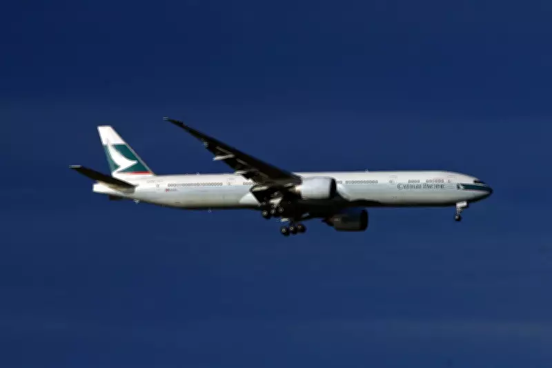 Man dies after collapsing mid-air on Cathay Pacific flight from Manchester
