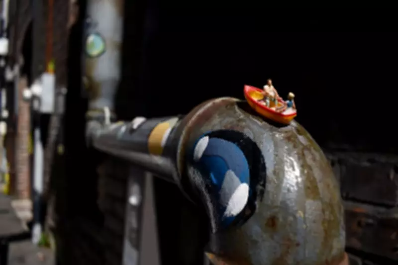 Miniature Art Transforms Hattiesburg Alley into Surrealist Wonderland