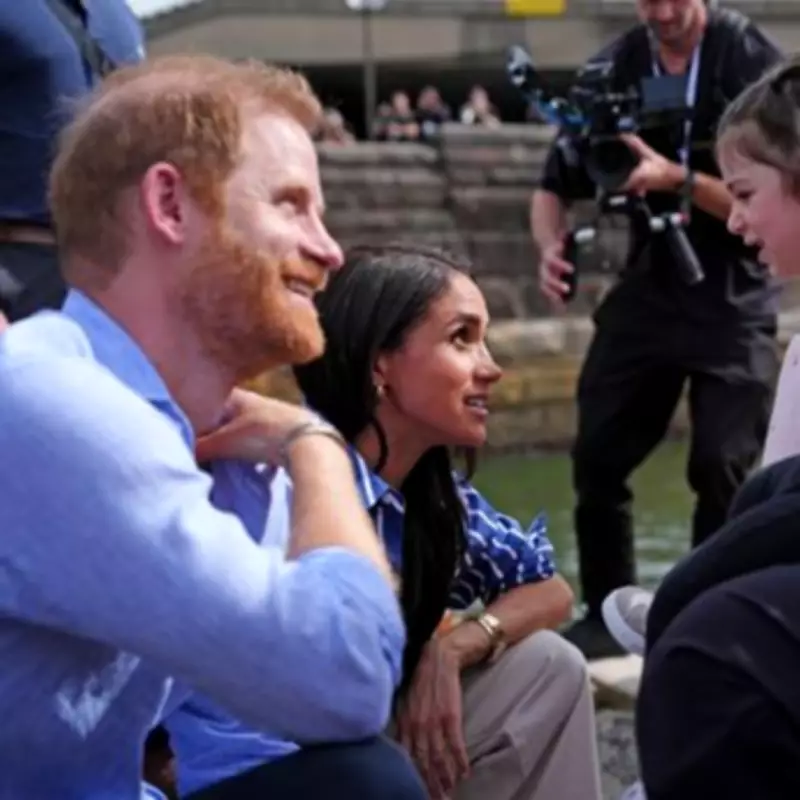 Prince Harry Dances with Young Girl Before Sailing Sydney Harbour with Meghan Markle