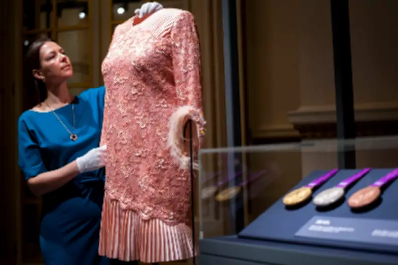 Queen Elizabeth II's Wardrobe Exhibition Unveils Olympic Skydiving Dress