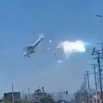 Dashcam Captures Plane Hitting Power Cables Before Crashing into LA Car Park