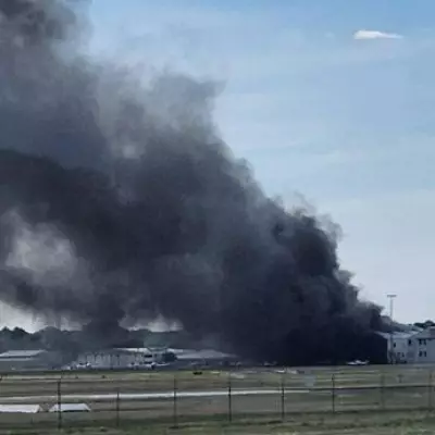 Plane Crashes into Hangar at Adelaide Airport, Thick Smoke Fills Sky