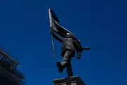 Banksy Claims New London Statue of Man Blinded by Flag