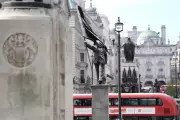 Banksy Claims New London Statue of Man with Flag on Pall Mall