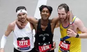 Boston Marathon Runners Praised for Helping Collapsed Competitor Finish