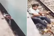 Father Shields Baby Under Moving Train in Bangladesh Miracle