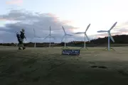 Greenpeace Activists Install Mock Wind Turbines at Trump's Turnberry Golf Resort