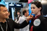 Humanoid Robots Showcase Boxing and Service Skills in Hong Kong Exhibition