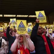 Liverpool Fans' Yellow Card Protest: Six-Word Chant Targets Owners
