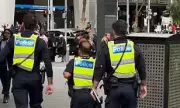 Melbourne Police Photo Sparks Height Requirement Debate Among Australians