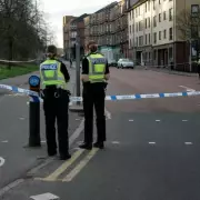 Police Lock Down Street Near Partick Thistle's Firhill Stadium in Glasgow