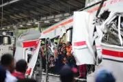 Rescuers Race to Free Three Trapped in Indonesia Train Crash
