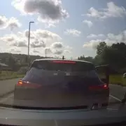 Road rage driver punches man unconscious as children watch in horror