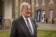 Sir Stephen Fry Sues Conference for £100K After Stage Fall