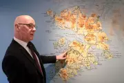 Swinney Pledges £300 Energy Support for Islanders Amid Housing Investment