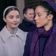 The Testaments Star Reveals Hidden Challenge of Gilead's Restrictive Costumes