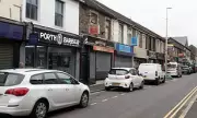 Welsh Town's Barber Boom Raises Eyebrows Amid Criminal Front Concerns