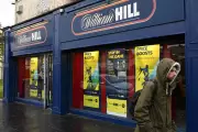 William Hill owner to close 270 shops amid tax hike and takeover talks