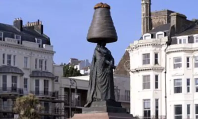 Artist Places Giant Walnut Whip on Queen Victoria Statue