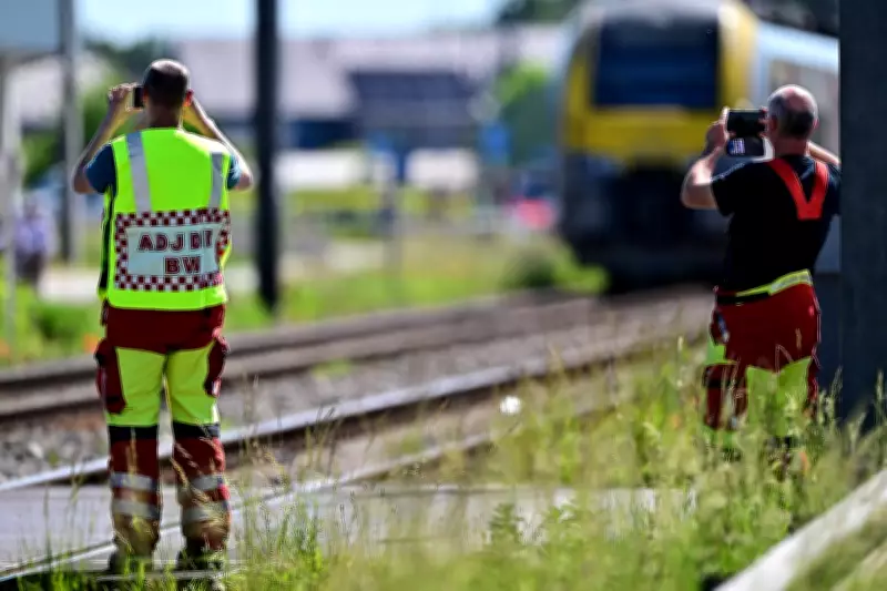 Belgium train-school bus crash kills two teenagers and two adults