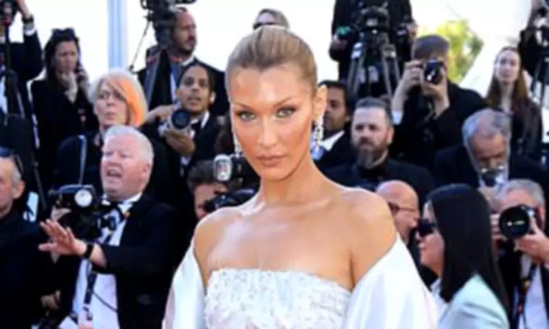 Bella Hadid Stuns in White Gown at Cannes Film Festival Premiere