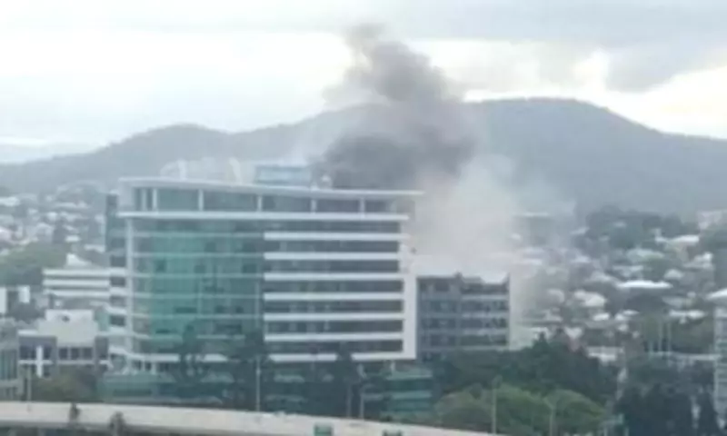 Brisbane Blaze: Person Rescued from Rooftop as Fire Engulfs Building
