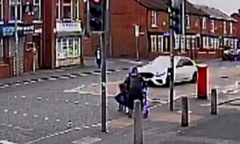 Car Speeds at Jewish Family in Salford Red Light Incident