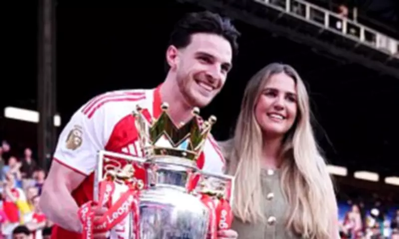 Declan Rice Celebrates Premier League Title with Family on Pitch