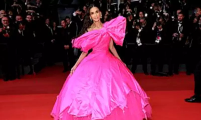 Demi Moore Stuns in Giant Pink Bow Dress at Cannes Paper Tiger Premiere