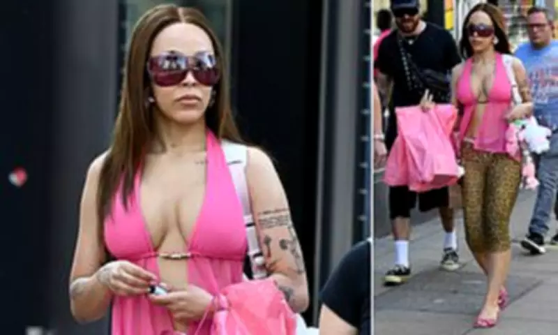 Doja Cat Turns Heads in Racy Pink Outfit for Manchester Shopping Spree