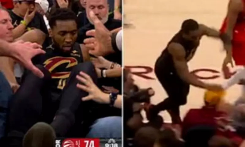 Donovan Mitchell crashes into fans during Cavaliers Game 7 win