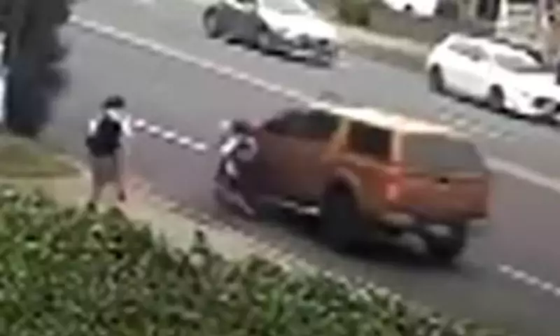 Driver accused of hitting boy with ute turns himself in to Sydney police