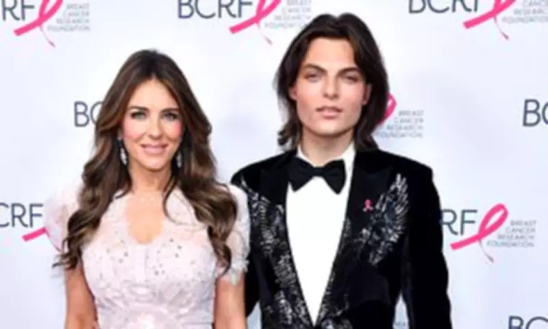 Elizabeth Hurley Stuns in Pink at Breast Cancer Research Gala with Son Damian