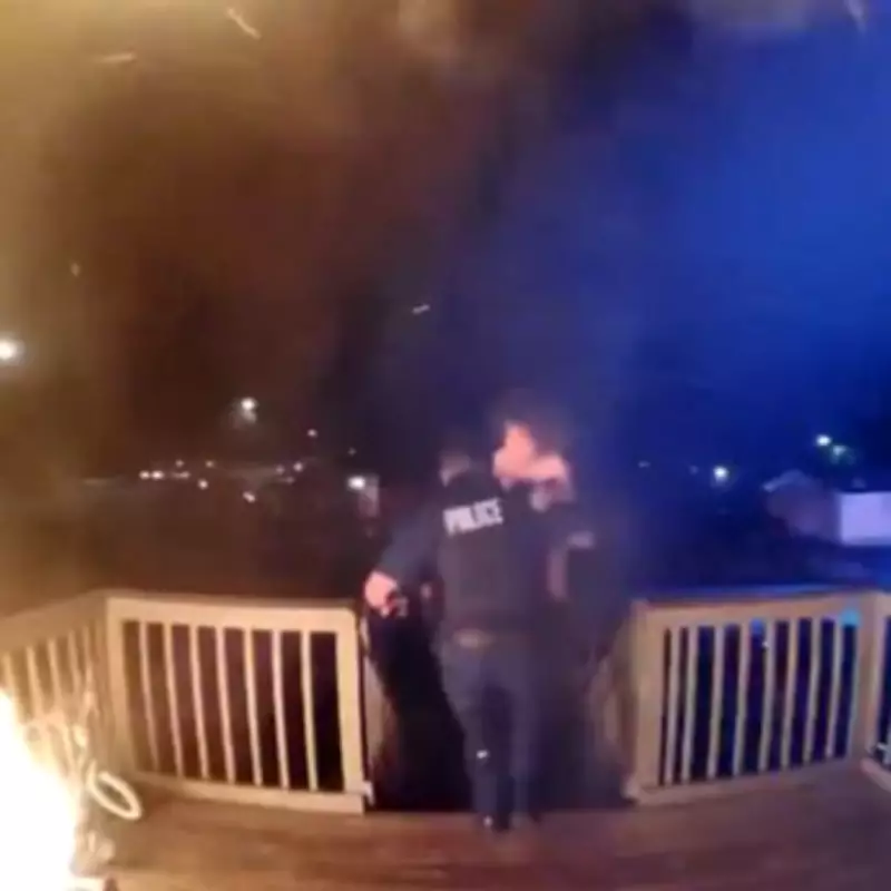 Hero Police Officer Runs Into Burning Building to Rescue Family