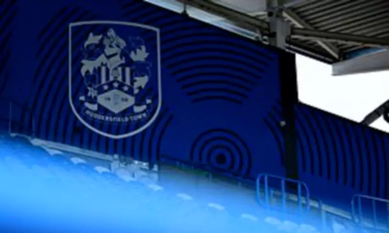 Huddersfield Town boss Liam Manning leaves after compassionate leave